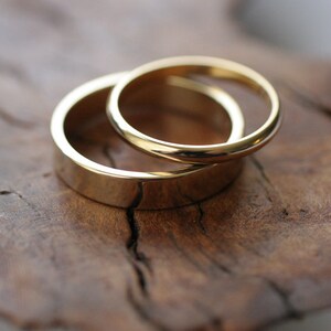 Odd couple 14k wedding bands image 3