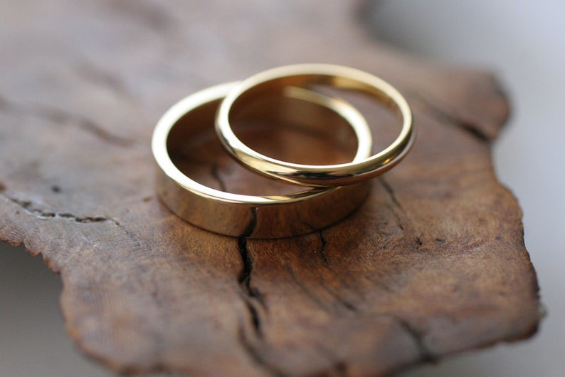 Odd couple 14k wedding bands image 3