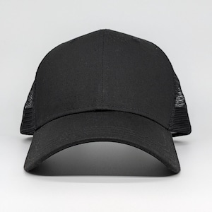 May include: A black trucker cap with a curved peak and a mesh back. The cap features a solid front panel and a snap closure. The hat is made of a durable fabric and is suitable for everyday wear.