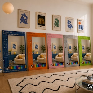 May include: Five rectangular floor mirrors with frames designed to resemble the Microsoft Paint software interface. The frames are blue, orange, pink, gray, and green, each featuring a toolbar, color palette, and menu bar along the edges.