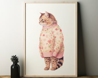 Puede incluir: Un gato marrón y atigrado con un suéter rosa floral. El gato está de pie sobre un fondo blanco.
