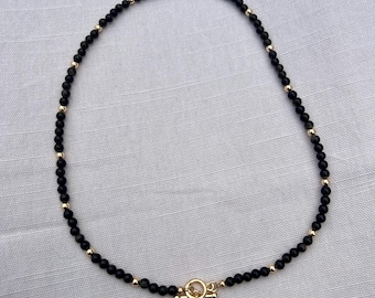Collana di perline di ossidiana dorata