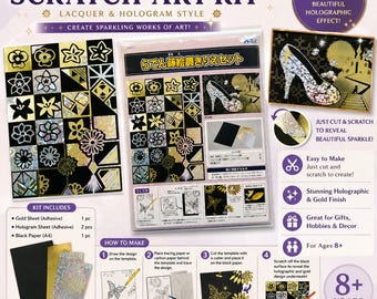 May include: A Rakuden Chie scratch art kit featuring a lacquer and hologram style. The kit includes a gold adhesive sheet, two hologram adhesive sheets, and black A4 paper. Instructions show how to draw, trace, cut, and scratch designs to reveal sparkling gold and holographic patterns.