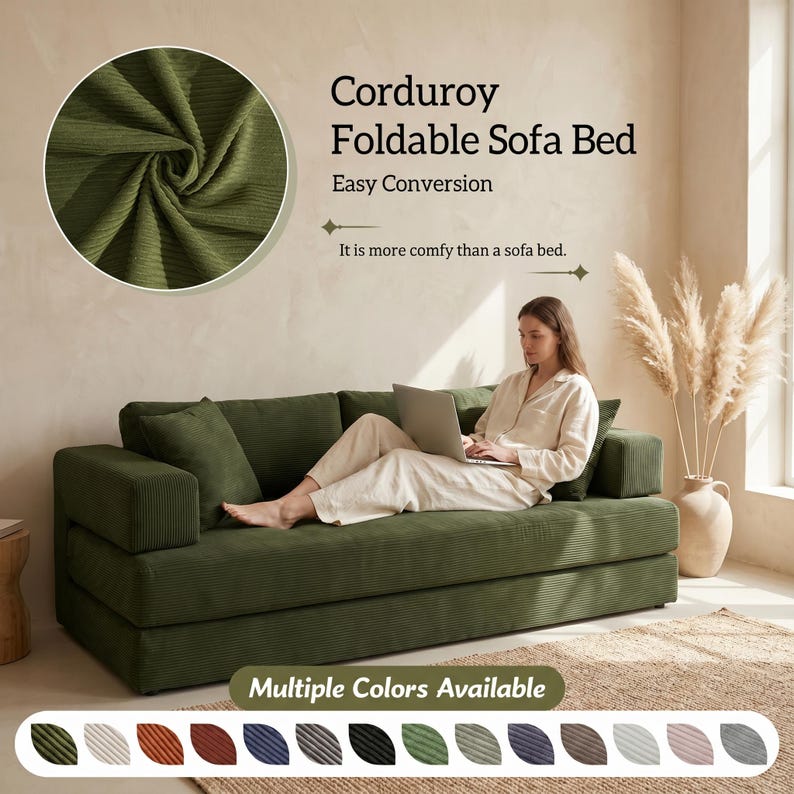 Modern green convertible folding sofa bed with ribbed corduroy fabric in a minimalist living room, featuring modular foam design, removable backrests, matching pillows, beige rug, and soft neutral decor near a large window.