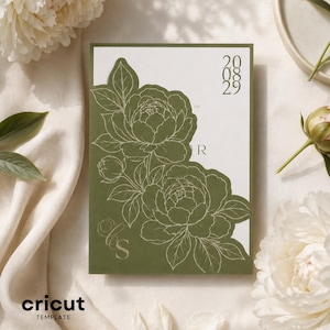 May include: A rectangular wedding invitation card featuring a white background with an olive green die-cut overlay. The overlay displays intricate line art of two large peony flowers and leaves, the letters "LS" in a script font, and the date "20 08 29".