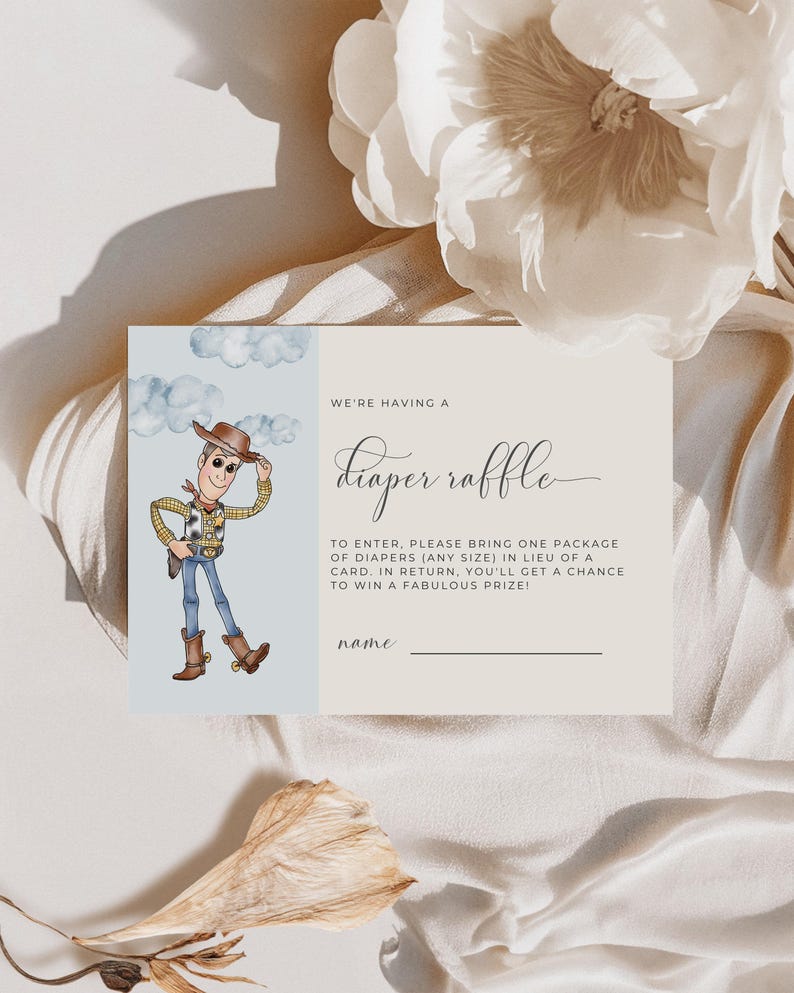 May include: A baby shower invitation card with a cartoon cowboy illustration. The card's text reads "We're having a diaper raffle". The card is light beige with a blue cloud background. The invitation is for a diaper raffle.