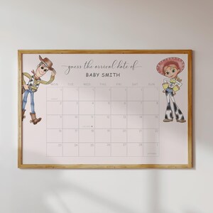 May include: A framed calendar with a light pink background and a grid of squares. The text "guess the arrival date of BABY SMITH" is written at the top. Cartoon characters Woody and Jessie are on either side.