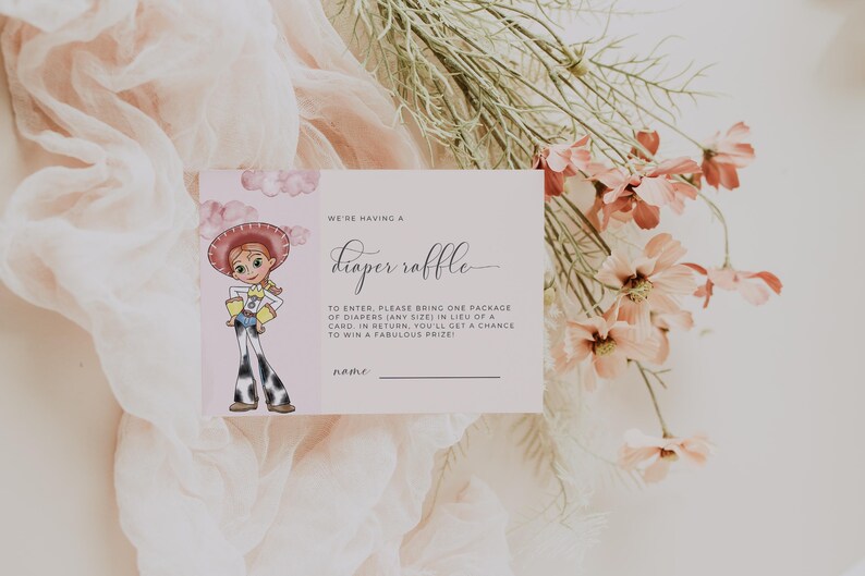 May include: A baby shower invitation card with a cartoon cowgirl illustration. The card reads "We're having a diaper raffle" and includes details about the raffle. Soft pink and white background with floral accents.