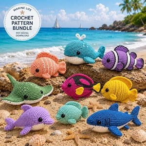 May include: A collection of eight colorful crochet marine animal toys including a blue whale, purple clownfish, orange fish, green stingray, pink fish, yellow fish, purple dolphin, light green fish, and a blue shark, with a digital pattern label.