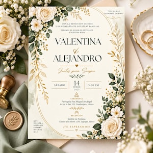 May include: A wedding invitation card featuring cream-colored paper with elegant black typography and gold foil accents. The design is framed by watercolor illustrations of white roses, green leaves, and golden branches, with text detailing the ceremony.