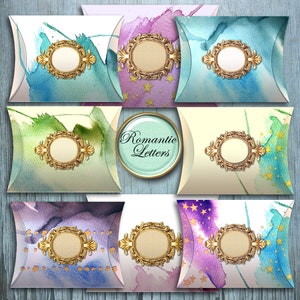 May include: Ten pillow boxes with watercolor designs. Each box has a gold ornate frame with a blank space in the center. The boxes are labeled "Romantic Letters".