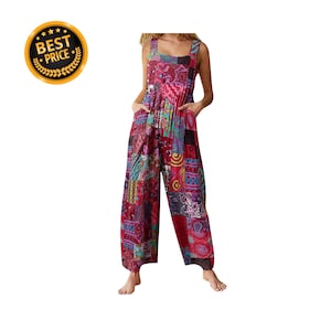 May include: A sleeveless jumpsuit featuring a vibrant patchwork pattern in shades of red, pink, purple, and blue. The garment has a square neckline, wide-leg trousers, and two side pockets. A circular gold badge with the text BEST PRICE is visible.