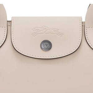 Cream designer tote bag Longchamp Le Pliage Xtra Medium size with spacious interior.