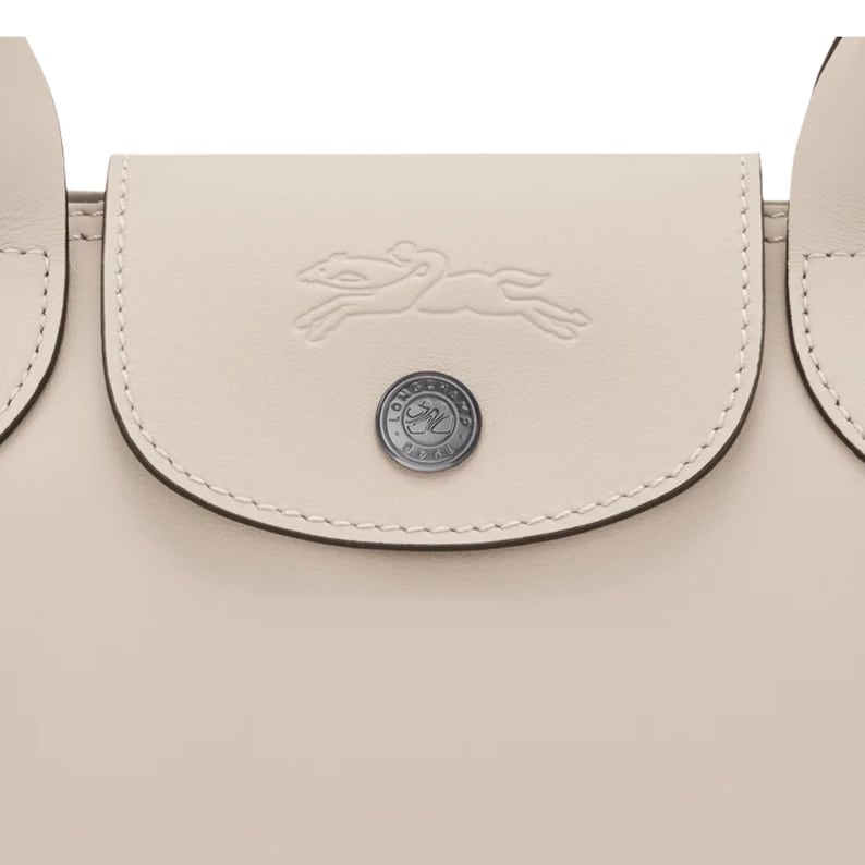 Cream designer tote bag Longchamp Le Pliage Xtra Medium size with spacious interior.
