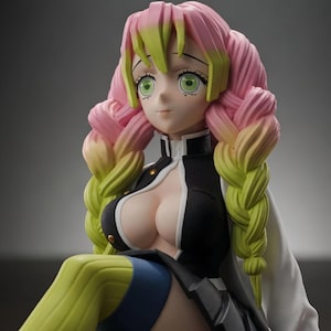 May include: A collectible anime-style figurine featuring a character with long, braided hair that transitions from pink to lime green. The figure wears a black uniform with a white collar, a white outer garment, and lime green socks with blue accents.