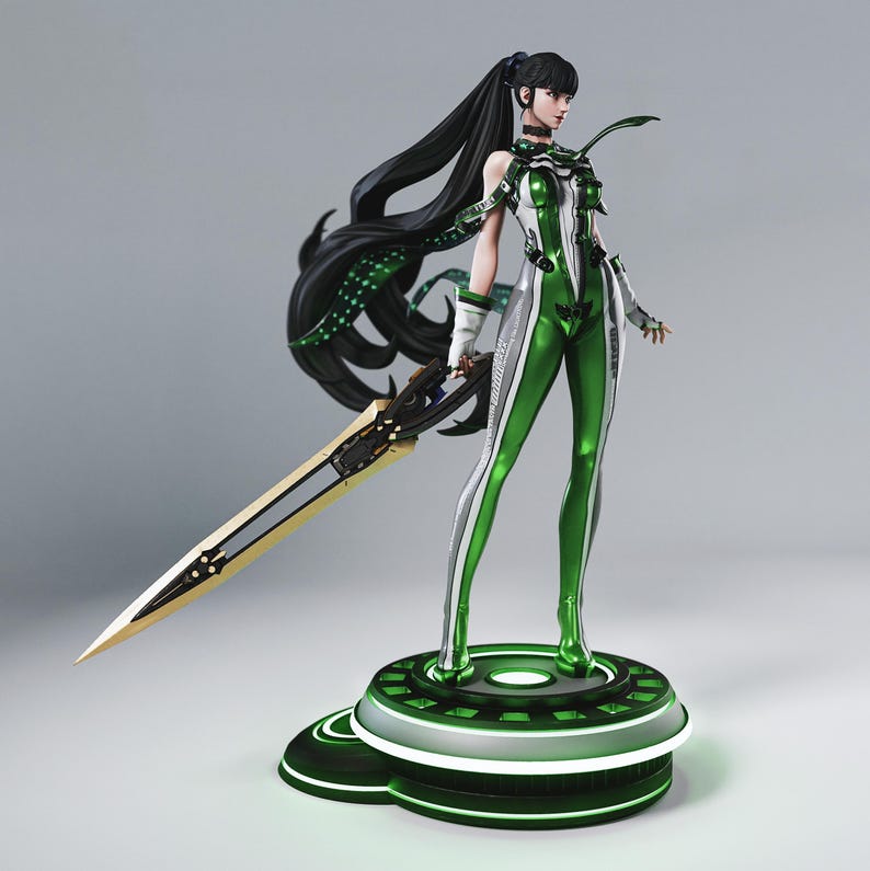 May include: A detailed figurine of a female character in a futuristic green and white suit, holding a large sword. The figure has long black hair and stands on a circular platform with green lighting. The sword has a gold blade.