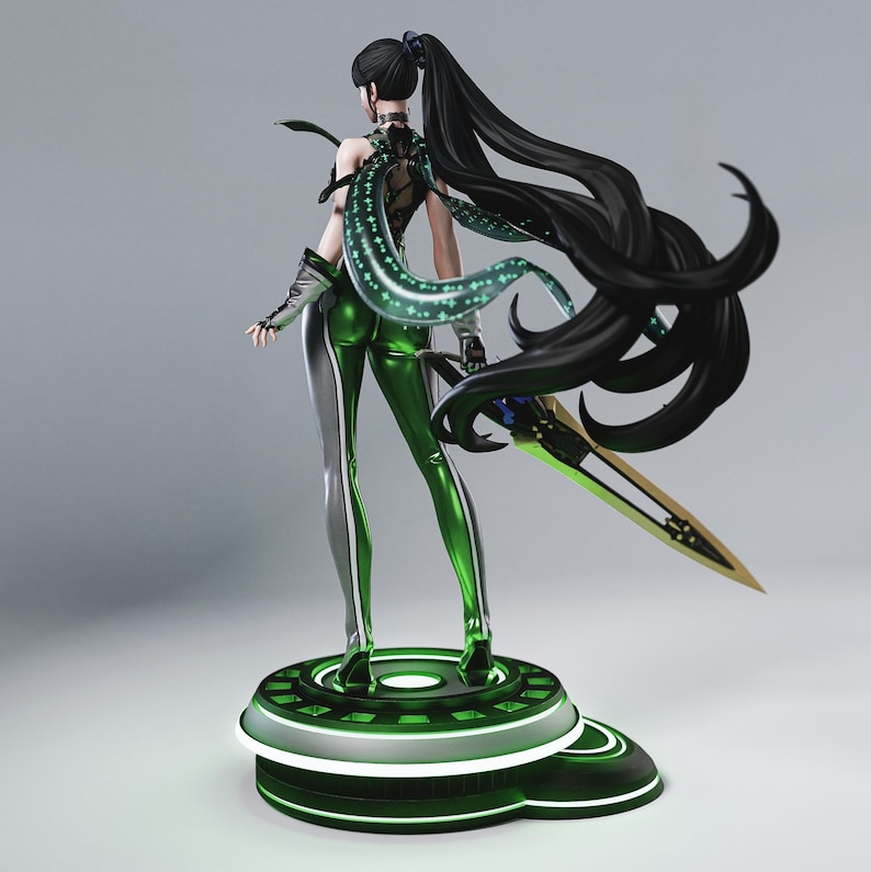 May include: A detailed figurine of a female character in a futuristic outfit. The figure is primarily green and silver, with long black hair and a glowing green energy effect. She is holding a sword and standing on a circular platform.