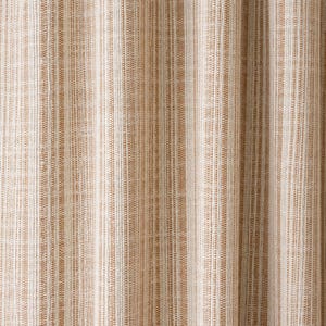 May include: A fabric curtain featuring a vertical striped pattern in shades of tan, beige, and white. The material has a visible woven texture with alternating thin and thick lines running vertically across the entire surface of the textile.