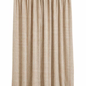 May include: A floor-length curtain panel featuring a vertical striped pattern in shades of beige, tan, and cream. The fabric has a visible woven texture and is gathered at the top with a rod pocket header, creating uniform vertical folds throughout.