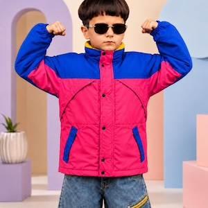 May include: A color-blocked jacket featuring a bright blue upper section and a vibrant pink lower section, with a high collar, long sleeves, and a front button closure. The jacket is paired with blue denim jeans that have a visible yellow zippered pocket.