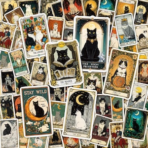 May include: A collection of rectangular tarot-style cards featuring various cat illustrations. Each card displays a unique feline character in artistic settings, including scenes with moons, stars, floral borders, and ornate frames with text labels.