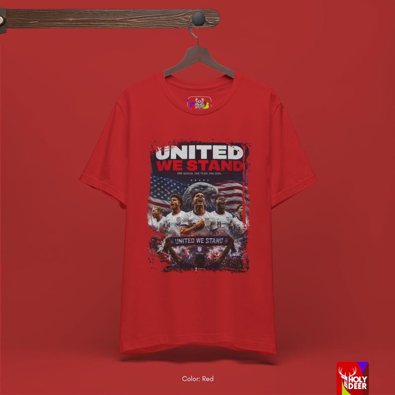 Lifestyle photograph of the USA soccer tee against a neutral background to highlight the premium black cotton and the detailed patriotic team graphic. This piece by HolyDeer serves as a unique world cup gift.