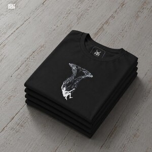 Detailed texture shot of the premium cotton fabric on this unique artist gift tee showing the clean print finish. The underwater icons are perfectly placed for a relaxed everyday street look that attracts buyers searching for clean and original art shirts at HolyDeer.