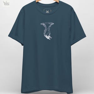 A premium deep ocean tee in deep teal featuring a highly detailed minimalist illustration of a white figure falling into the water, centered on the chest. This falling in water minimalist t-shirt by HolyDeer perfectly captures the surreal drowning top energy for all styles.
