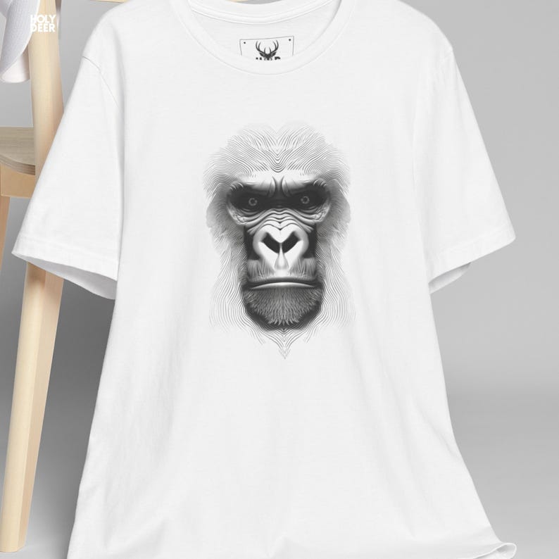 This edgy streetwear top apparel in white presents a professional and powerful look for wildlife advocates, street art enthusiasts, and minimalist design collectors. HolyDeer emphasizes intense vector craftsmanship in this geometric animal shirt that fits perfectly in a clean closet.