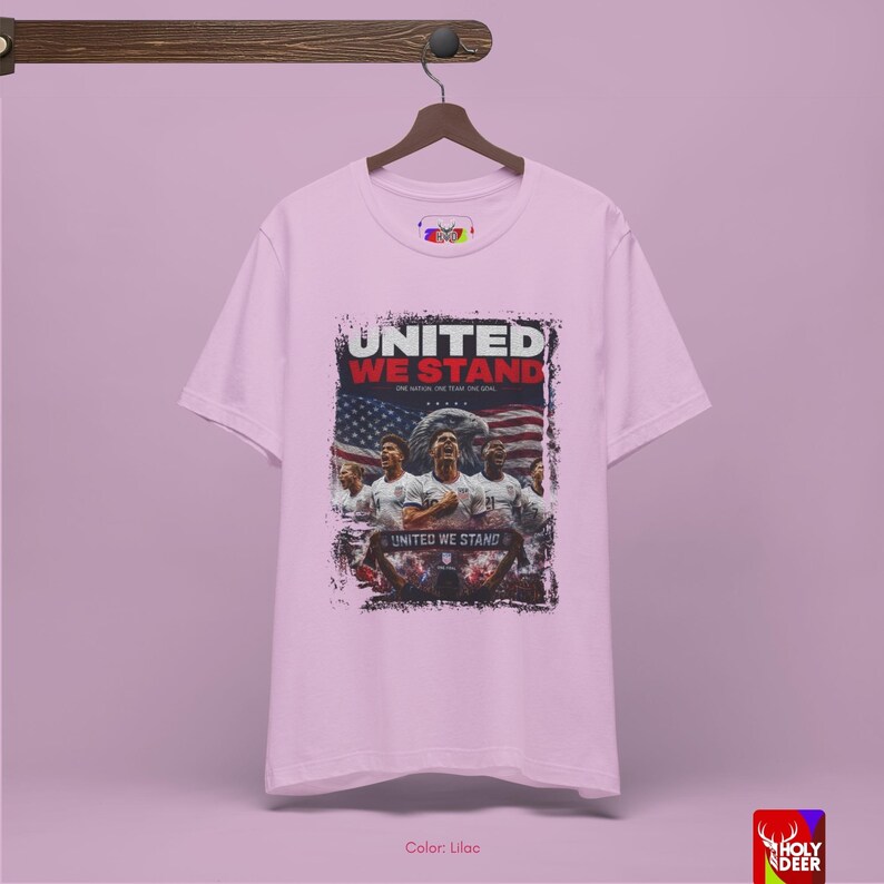 A lifestyle image of the USA soccer tee paired with urban streetwear to suggest a complete matchday look. HolyDeer creates a visual story that makes the buyer feel this World Cup 2026 tee is a necessary addition.