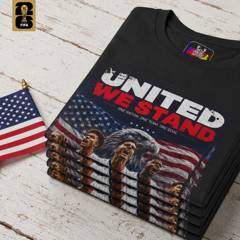 Close up detail of the USMNT patriotic art design on a soft black fabric showcasing the rich textures of the eagle feathers, the stars and stripes flag, and the bold white and red typography. This USA fan gift from HolyDeer is a true stadium classic.