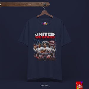 Detailed view of the USA pride tee icons featuring the eagle and squad concept on a black base. This holydeer original captures the ultimate team spirit of American soccer history for the upcoming World Cup 2026.