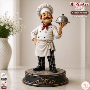 May include: A figurine of a chef wearing a white toque, a white double-breasted jacket with black buttons, a red neckerchief, and black pinstriped trousers. The chef holds a silver cloche on a tray, standing on a circular base with stone texture.