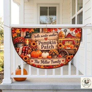 May include: A semi-circular decorative porch sign featuring a fall theme with pumpkins, sunflowers, a red truck, a barn, and a lantern. The text reads: hello, sweater weather, Pumpkin Patch, and The Miller Family, surrounded by orange autumn leaves.