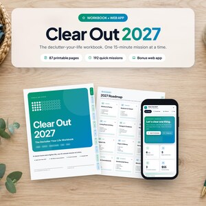 May include: Clear Out 2027 decluttering workbook featuring 87 printable pages, 192 quick missions, and a bonus web app. The set includes a printed workbook cover, a 2027 roadmap page, and a smartphone displaying the web app interface.