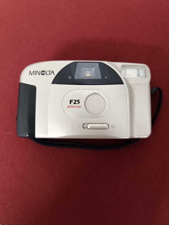 Vintage film camera Minolta F25, working, point and shoot