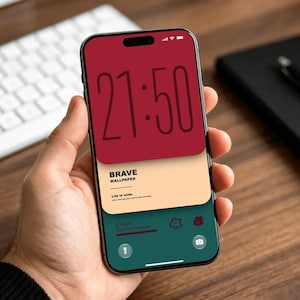 May include: A smartphone displaying a digital interface with a dark red top section showing the time 21:50, a beige middle section with the text BRAVE WALLPAPER and Life is wide, and a dark green bottom section with icons and camera controls.