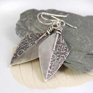 Romeins gegraveerde zilveren oorbellen - speerpunt relikwie