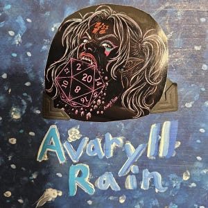 May include: A circular sticker featuring a black and white illustration of a person with pigtails biting a pink twenty-sided die. The text Miss Me is on the forehead. Below the sticker, the words Avaryll Rain are painted in light blue letters.