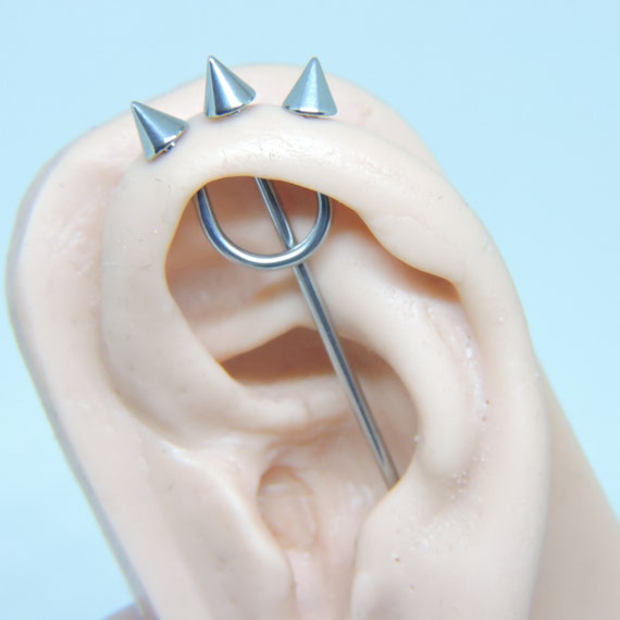 Trident piercing shop bar