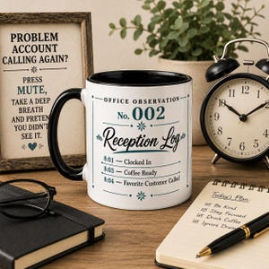 May include: A white ceramic mug with a black handle and interior, featuring the text Office Observation No. 002 Reception Log, followed by a list of times and activities: 8:01 Clocked In, 8:03 Coffee Ready, and 8:04 Favourite Customer Called.