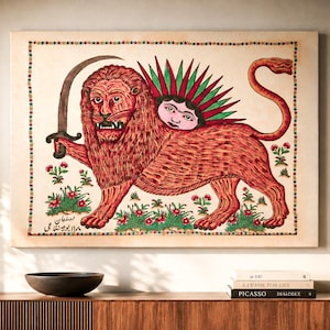 May include: A rectangular wall art print featuring a stylized red lion holding a curved sword. The lion has a human face emerging from its back surrounded by green rays. The artwork includes small floral motifs and Persian script text.