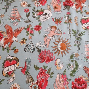 1 Yard Tell Tale Tattoo Slate Background Alexander Henry Fabric 8991C