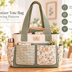 May include: An organizer tote bag sewing pattern featuring text that reads Organizer Tote Bag Sewing Pattern. The bag is sage green and cream with two front pockets, one in a green gingham print and one in a floral print, each with a wooden button.