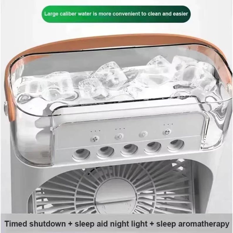May include: A white and clear air cooler with a brown top, filled with ice cubes. The front panel has several control buttons and air vents. Text on the image reads: "Large caliber water is more convenient to clean and easier" and "Timed shutdown + sleep aid night light + sleep aromatherapy."
