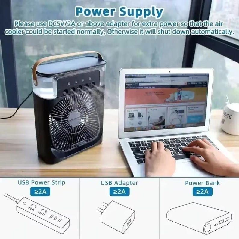 May include: Black and clear air cooler with a wooden handle, next to a laptop. The text "Power Supply" and instructions are visible. Below are illustrations of a USB power strip, adapter, and power bank, each labeled with "&ge;2A".