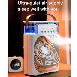 May include: White and gray portable air cooler with a brown handle. The device has a fan with a protective grill and control buttons. Text on the device reads "Ultra-quiet air supply sleep well with you." A small digital clock displays the time.