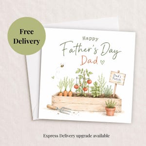 May include: A Father's Day card with a watercolour illustration of a garden scene. The card features a wooden planter box with carrots, tomatoes, and herbs. Text reads "Happy Father's Day Dad". A small sign says "Dad's Patch".