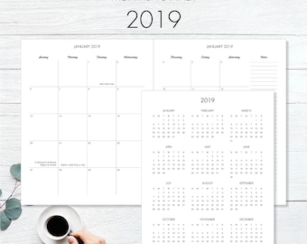 May include: A black and white monthly planner for the year 2019. The planner includes a calendar view for each month, with the days of the week labeled. The planner also includes a section for notes and to-do lists.
