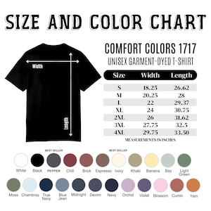 May include: A black unisex garment-dyed t-shirt with a size and colour chart. The chart lists measurements in inches for sizes S to 4XL. Colour options include white, black, pepper, and more.